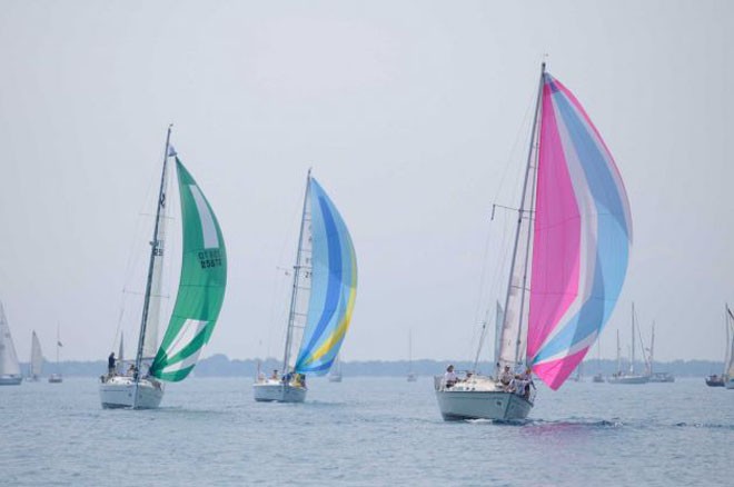Revelry of Grosse, left; Prosecco of Whitby Yacht Club Pointe Sailing Club, center; and Whirlwind of Tawas Bay Yacht Club sail up the lake Saturday, July 14, 2012, during the Cruising C Class of an annual Port Huron to Mackinac Island, Mich., sailboat race - Bayview Mackinac Race 2012 © The Times Herald, Mark R. Rummel / AP